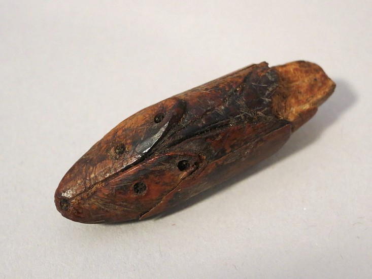 Alaskan Antiquities Anonymous, Fox amulet, Okvik
Fossilized ivory, 1 3/4 x 58 x 58 in. (4.5 x 1.6 x 1.6 cm)
01730-1