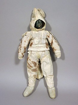 Inuit Anonymous -&nbsp;Coppermine Inuit doll with caribou skin clothing and stone head