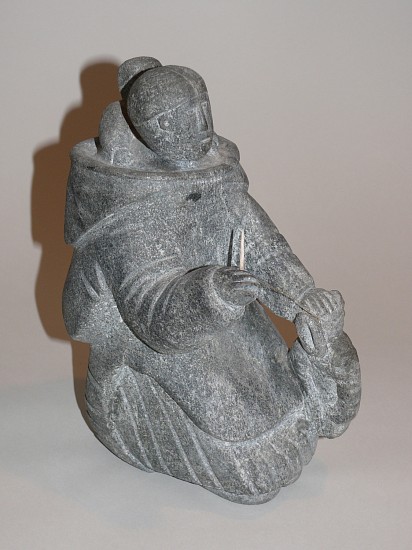 Miaiji Uitangi Usaitajuk, Mother sewing
9 3/4 x 5 x 6 1/2 in.
Provenance:The Peter J. Landry Collection of Inuit Art, U.S.A.Exhibited:Sugluk: Sculpture in Stone, 1953-1959, exh. cat., Art Gallery of Windsor, (Windsor, ON), 1992, illustrated with two views, pages 32 & 33, cat. no. 22This work is accompanied by the Art Gallery of Windsor hand written exhibition label.Literature:Sugluk: Sculpture in Stone, 1953-1959, page 26 & 31Note:Mother Sewing by Miaji (Mary) Usaitiajuk Uitangi, “emphasizes the central role of the woman in Sugluk. The sculpture represents a woman mending a child’s parka with thread dried and split from caribou sinew. The arcing rhythmic thread constructs a memorable metaphor of woman as the provider and protector of her children at the center of the world.”This maternal portrait of the altruistic mother and her child empathizes the significance of the role of women and reiterates the regional preference for modest scenes of daily life.
03469-2