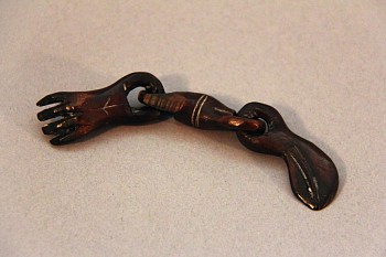 Works: Hand and whale on chain