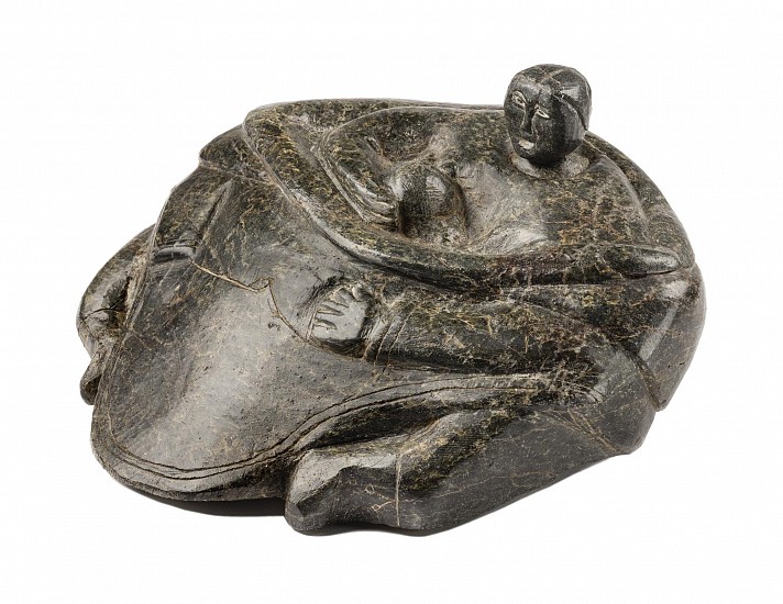 Attributed to Isa Aqiattusuk Smiler, Mother nursing child, c. 1951

Mother Nursing a Child is surely one of the earliest examples of its type in existence. It was likely carved in 1951, though it is possible that it was carved already in 1950. This extraordinary sculpture has all the hallmarks of the theme, one of the most iconic in Inuit art. The seated motherâ€™s body and clothing are exaggerated in bulk. She has pulled down the top of her amautiq, baring her shoulders, and has manoeuvred her child to the front so it can nurse. She has also withdrawn her right arm from her sleeve so that she can hold the child to her breast. The unusually flattened form of the work is no doubt due to the original shape of the stone; we think this also why the artist was obliged to add the womanâ€™s head as a separate piece â€“ there was simply not enough stone. This is a brilliant solution to a practical problem, and one that we have observed several times in other Inuit sculptures. It is a testament to the ingenuity of the artist, just as the overall composition is a testament to his artistic vision.

Much as we might like, it is not always possible to make attributions for special works. In the end, it is the beauty and strength of the work itself that really matter. Having said that, we think there is good reason to suggest that this superb early sculpture could be the work of one of the great Inukjuak masters, Isa Smiler. The Walkerâ€™s Nov. 2016 catalogue proposed a chronology for the major early mother-and-child works by Isa Smiler (c. 1952-1955).  That analysis would place our example at the front of that timeline, if it is indeed by Isa Smiler: c. 1951.

Literature: For a similar c. 1952 work attributed to Isa Smiler see Walkerâ€™s Nov. 2016, Lot 39. See the section devoted to this artist in Darlene Coward Wight, Early Masters: Inuit Sculpture 1949-1955 (Winnipeg Art Gallery, 2006) pp. 92-97. For comparable works in a similar low-slung format (but by different hands) see Early Masters, p. 35 and Swinton (1972/92) figs. 296 and 298.
03527-2
